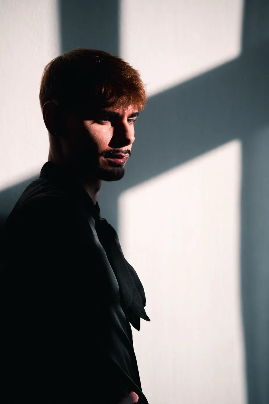 Elias Vance photographed in a studio between takes