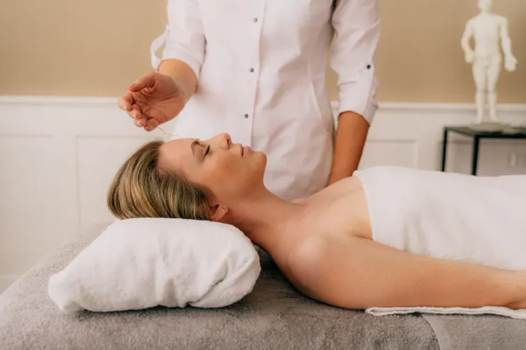 Patient resting during an acupuncture session