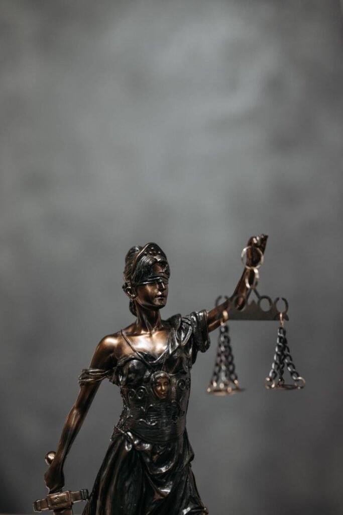 Bronze statuette of Lady Justice holding scales