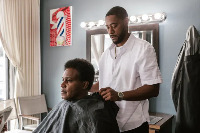 Marcus Reed, Master barber, fades and tapers