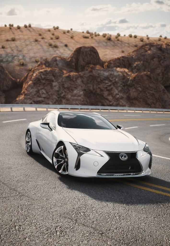 White car on a scenic desert road