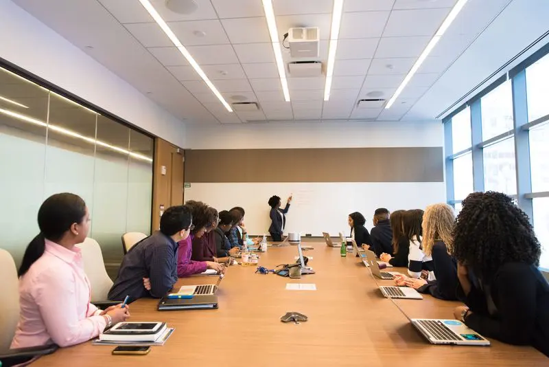Professionals talking in an office