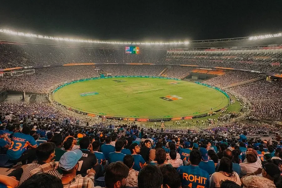 Packed stadium during a night cricket match