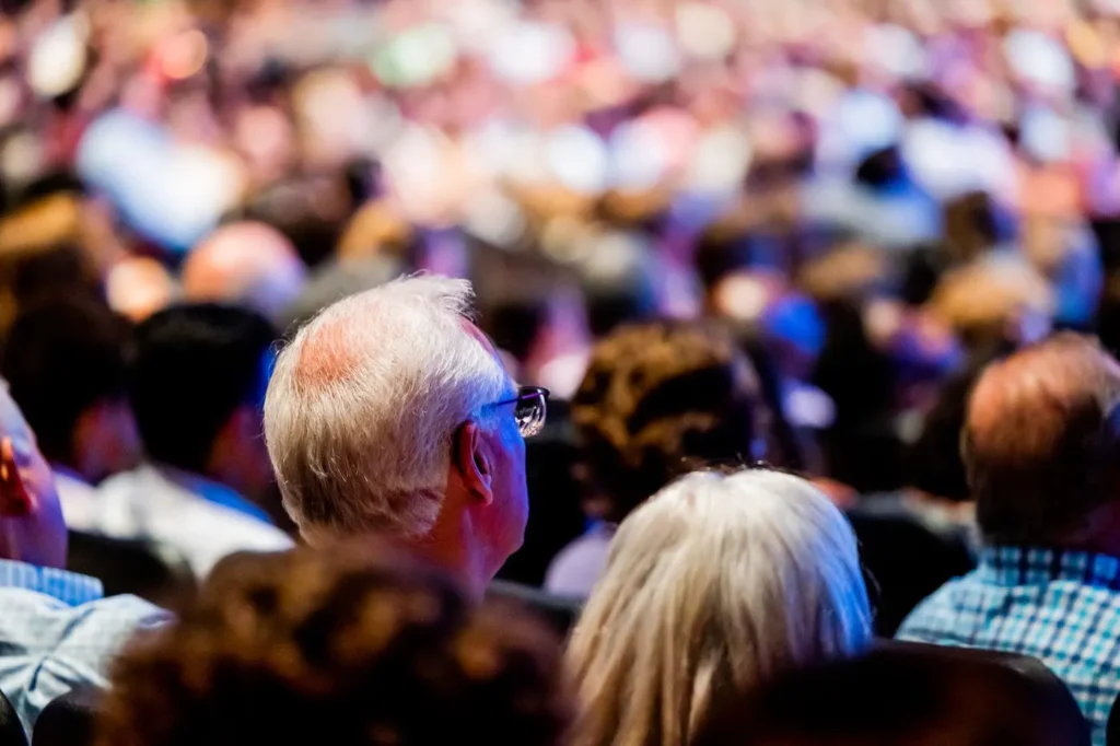 Audience seated at a large conference