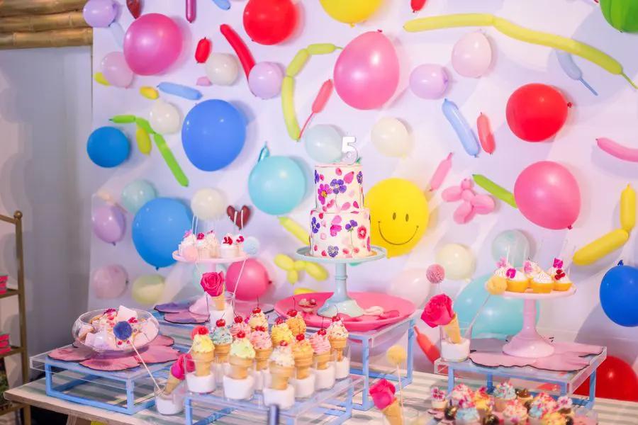 Birthday dessert table with balloons