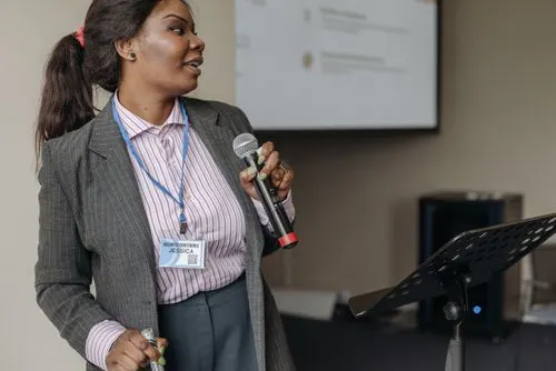 Woman presenting at a business seminar