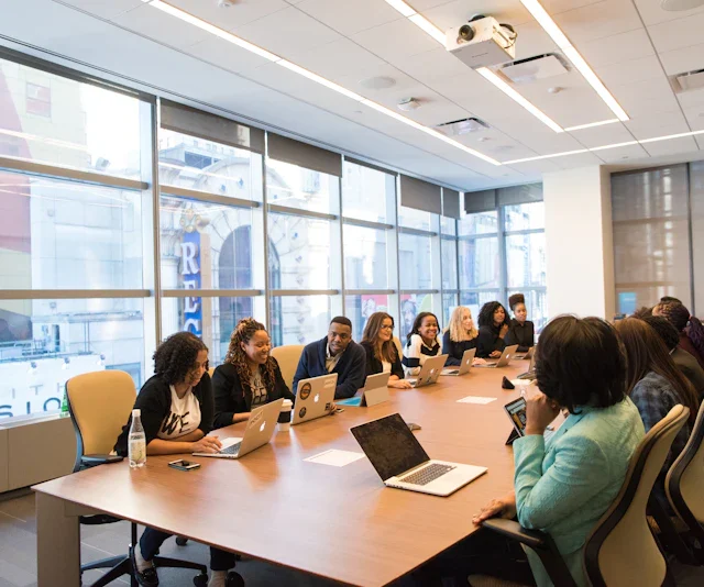 Analysts comparing portfolio allocations during a review