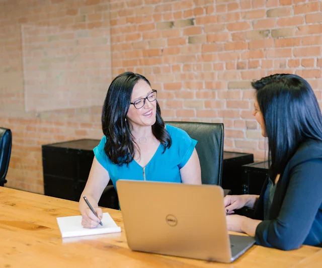 Adviser guiding a client through her savings strategy