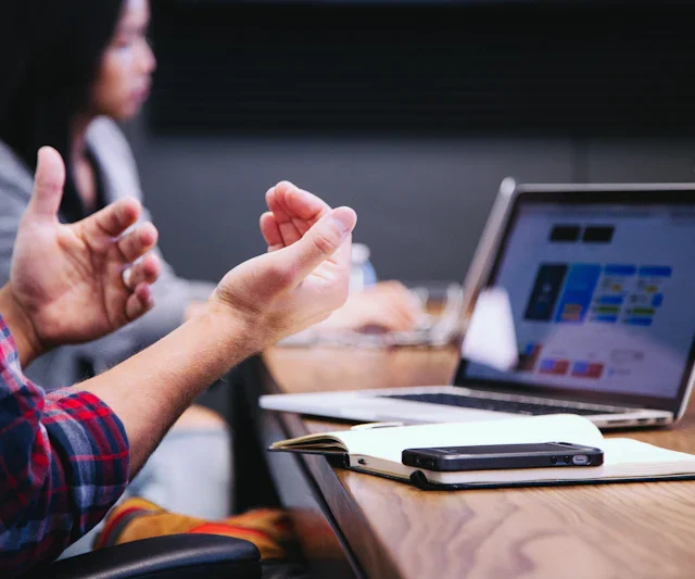 Adviser explaining a multi-year tax projection to a client
