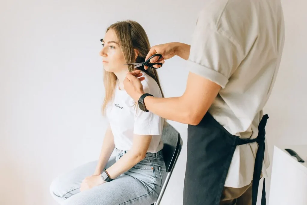 Woman getting a precision haircut