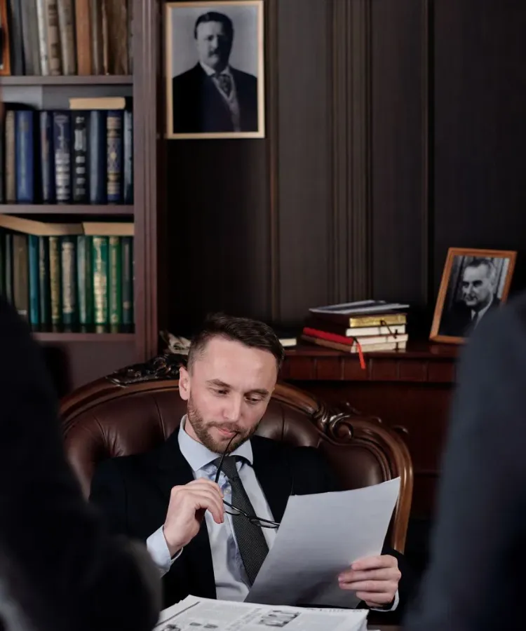 An SWP attorney reviewing documents in the firm's office