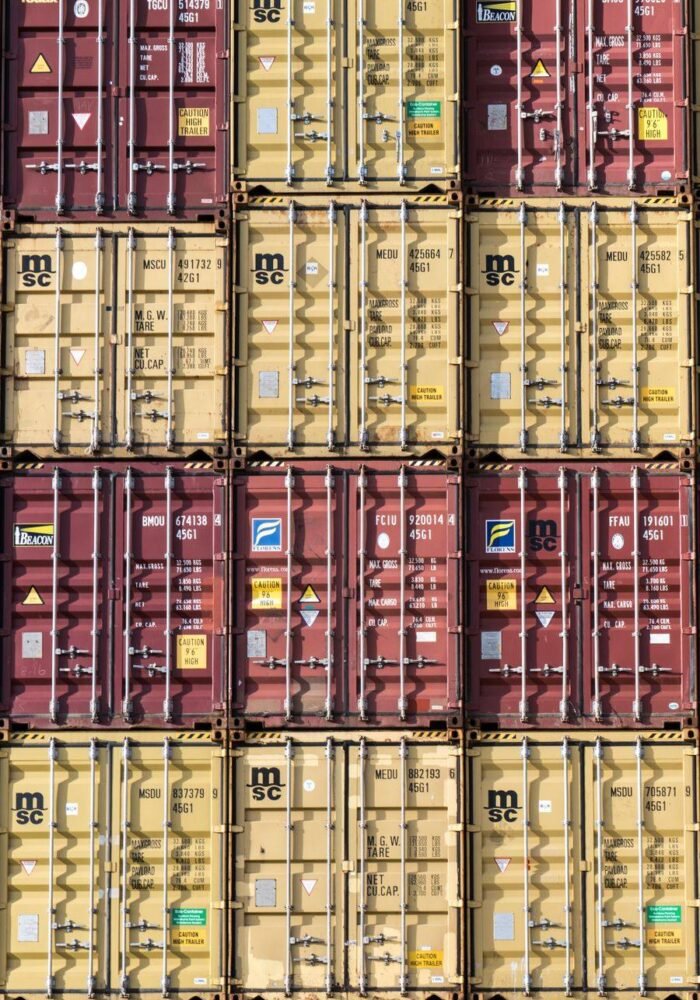 Stacked red and yellow shipping containers