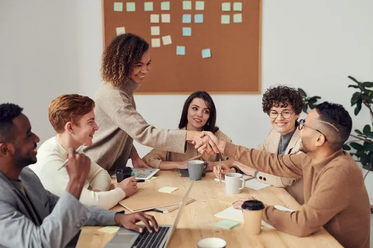 Team discussing a marketing plan around a table