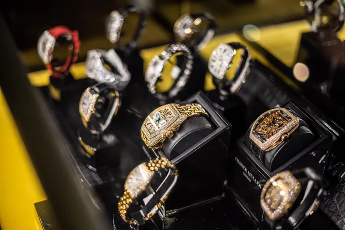 Pre-owned luxury watches in the display case