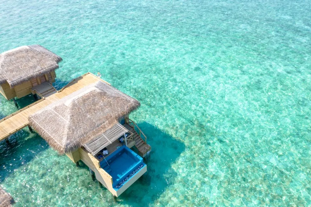 Aerial view of the lagoon and overwater bungalows