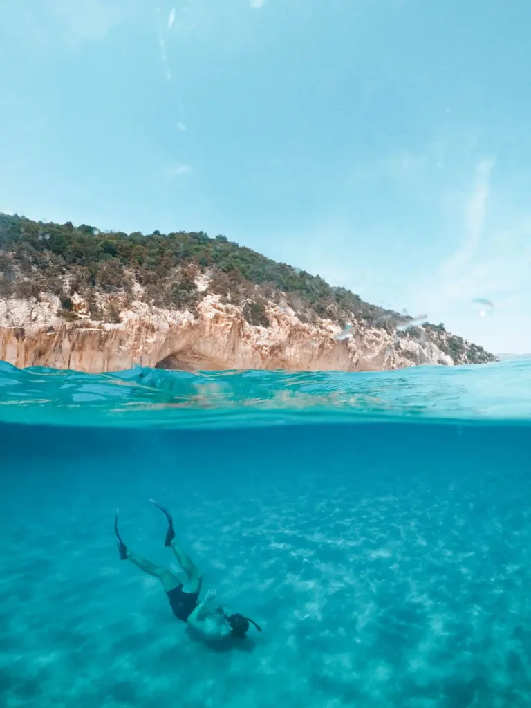 Diver in clear turquoise water