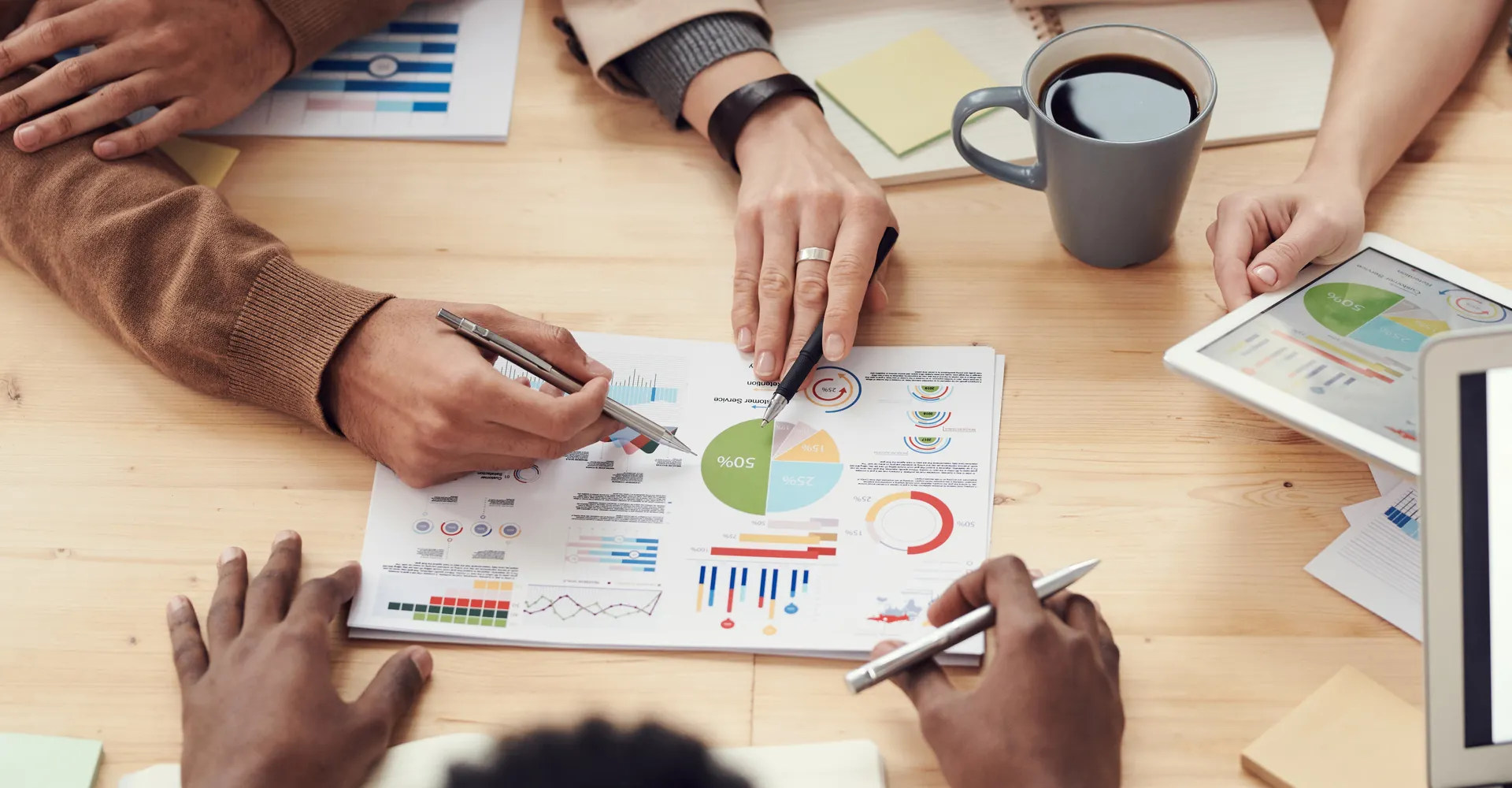 Advisors reviewing figures together at a table