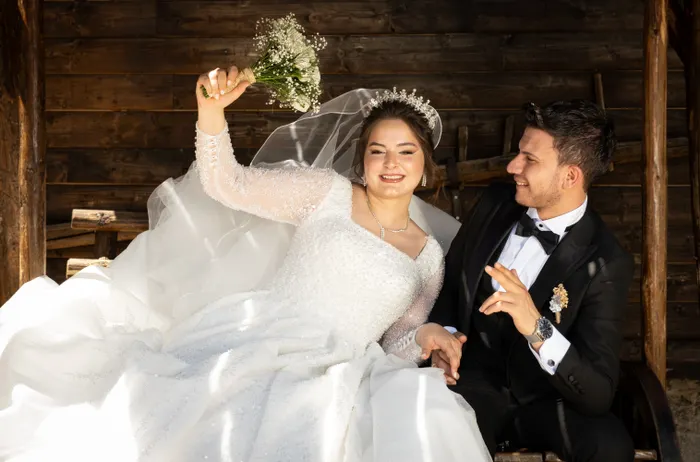 Bride and groom posing