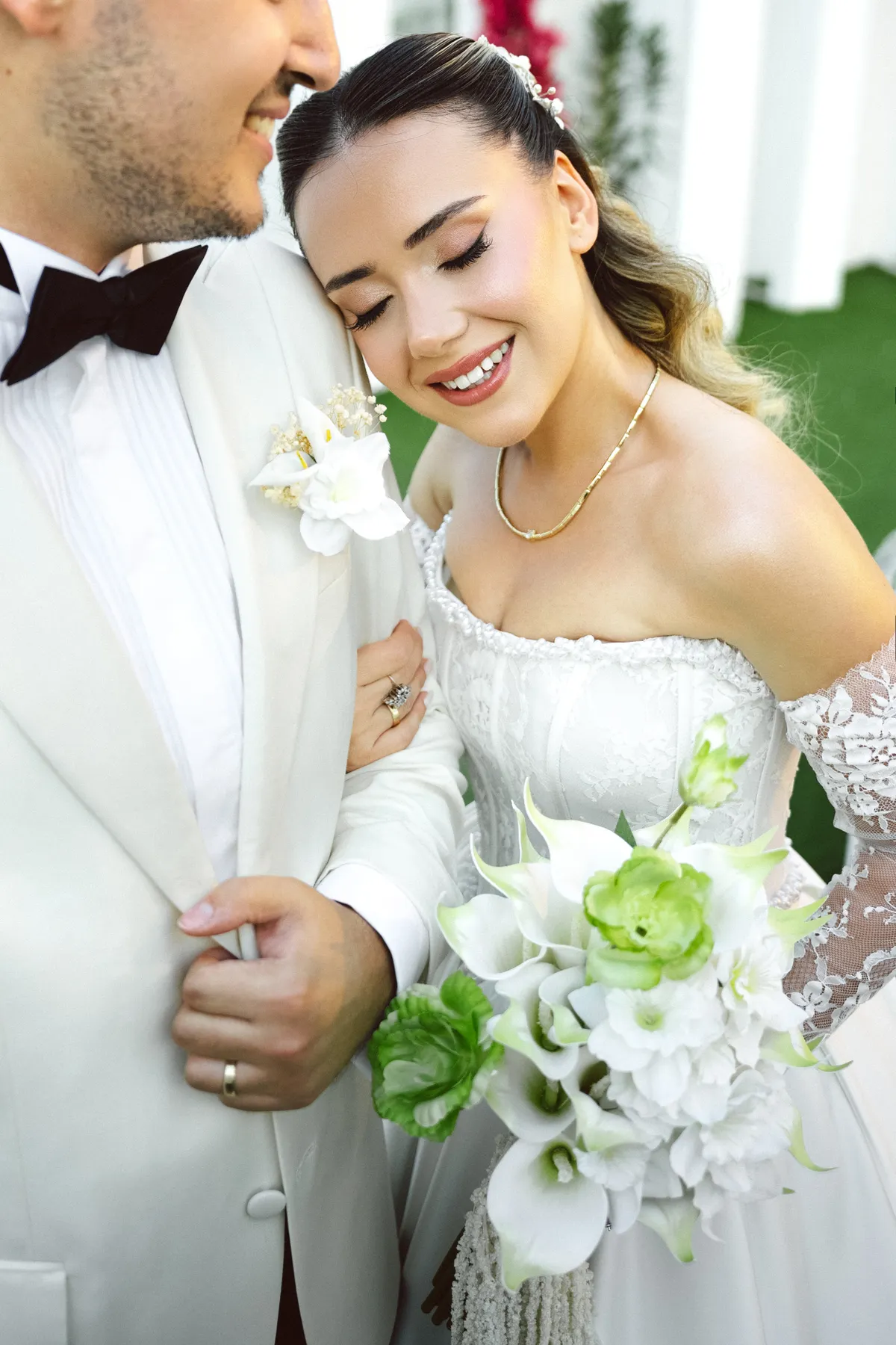 Bride and groom embracing on their wedding day