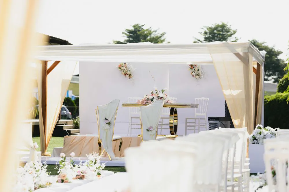Outdoor ceremony in white and pastel flowers