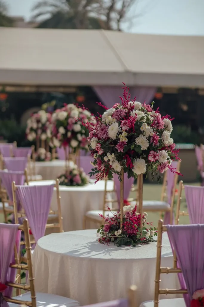 Outdoor reception with floral centrepiece