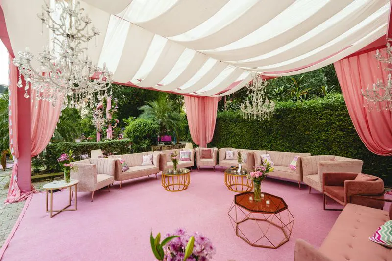 Garden lounge with drapery and chandeliers