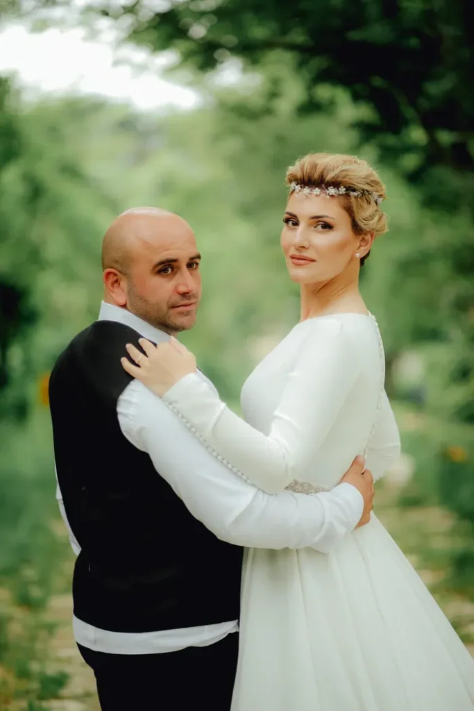 Couple looking back over their shoulders